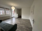 Wohnzimmer - Hübsches 1-Zi.-Appartement mit EBK und Balkon in Bremen Schwachhausen