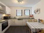 Küche Beispiel - Moderne 4-Zimmer-Wohnung (Leerstand) mit Balkon und Garage in Weye – WE04